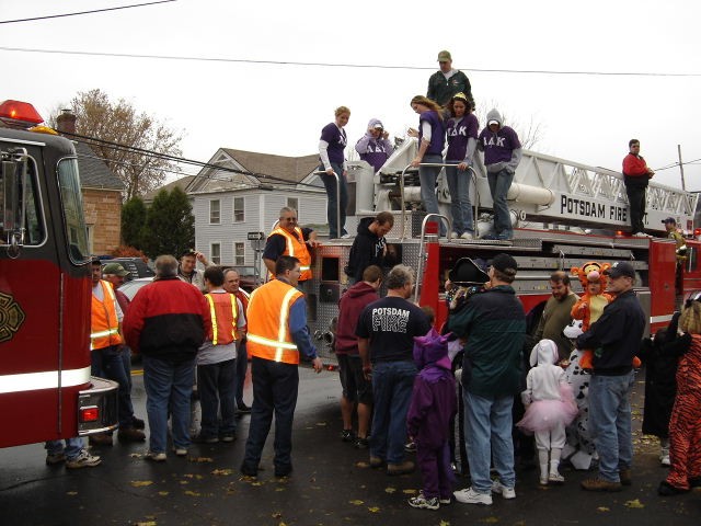 October 2004 - Firefighters loading the apparatus during the annual Halloween Party