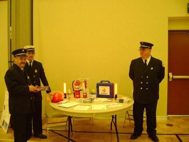 Chief Tim Jerome and firefighters Bob Farnsworth and James Corbett at an emergency preparedness fair.