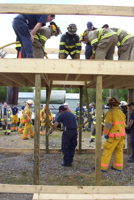 May 2005 - Jersey City Firefighters demonstrating the &quot;Columbus Drill&quot; at the Mayday, Mayday- Firefighter Down training at the George E. Briggs Training Center In West Potsdam